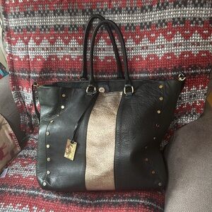 Toscani. Made in Italy all leather . Beautiful black and gold satchel . Large